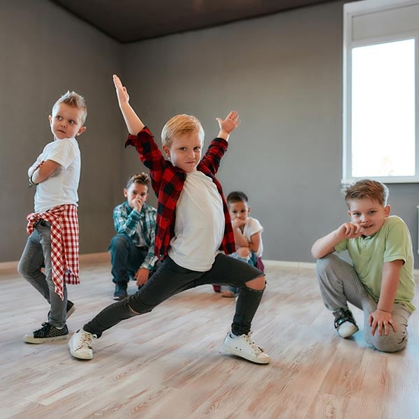 young boys in hip hop class at LA Dance Academy taught by a male teacher