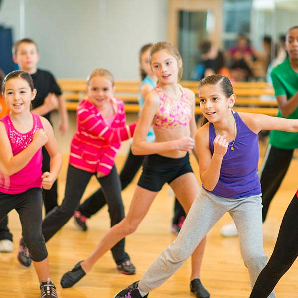 young kids in jazz class working on their personality and performance