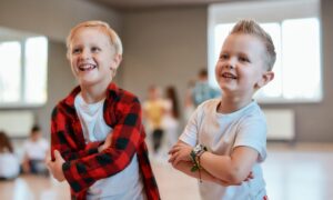 two boys in hip hop class having fun with their male teacher at LA Dance Academy