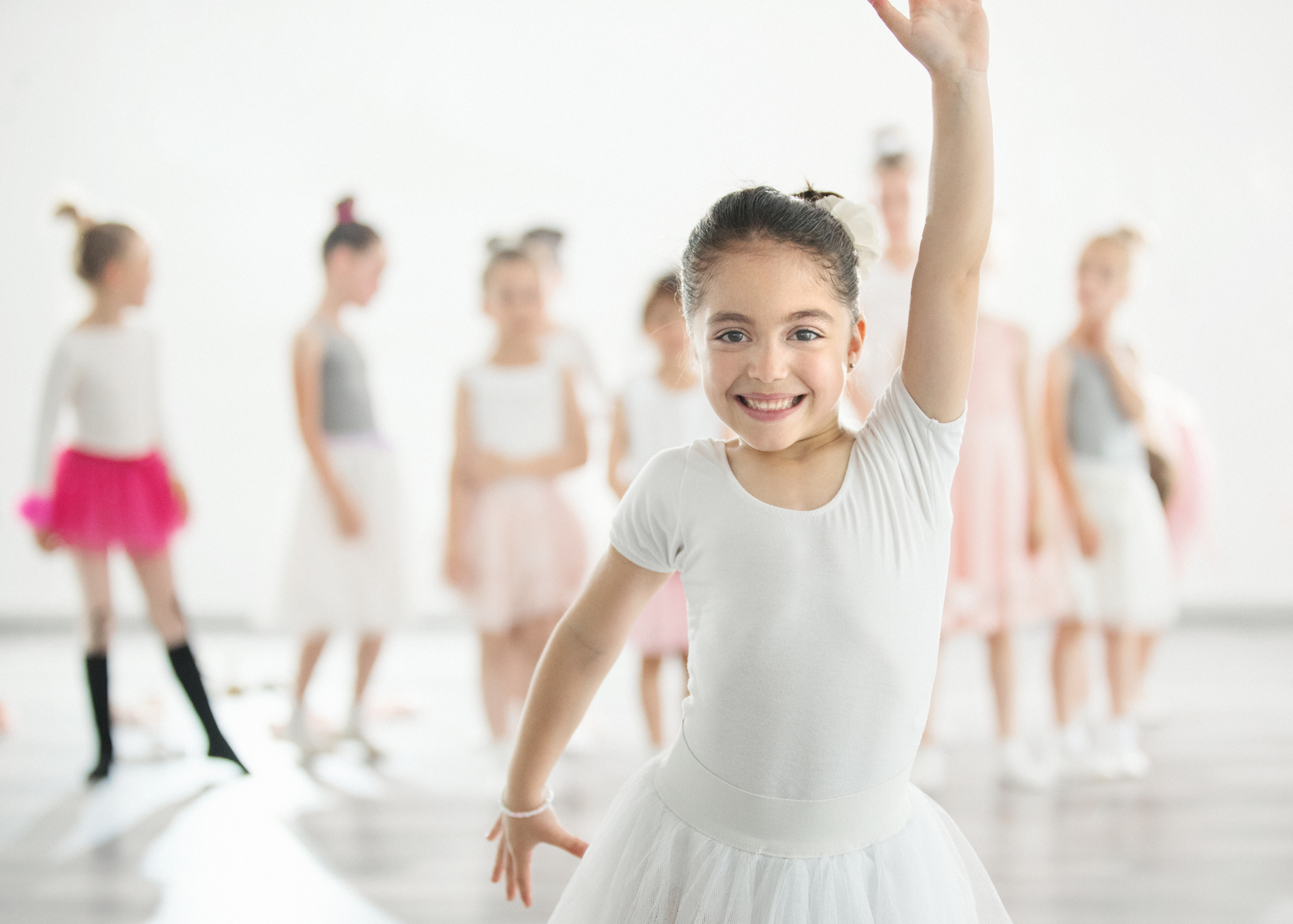 beginner lyrical student working on her performance during a class exercise