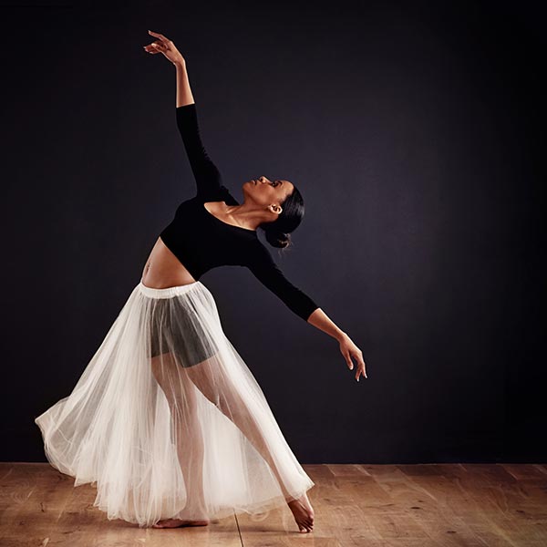 lyrical intermediate student in a beautiful arabesque in lyrical class at LA Dance Academy