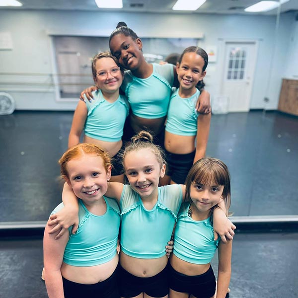 Mini team smiling after a rehearsal at LA Dance Academy