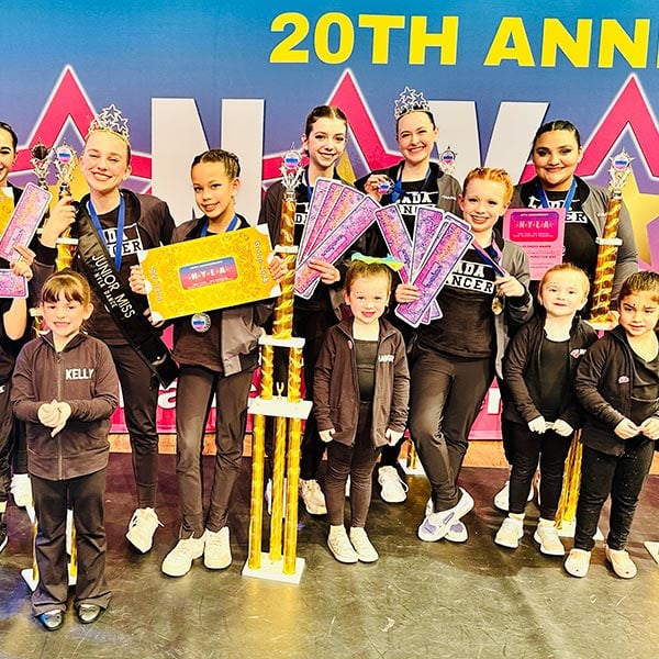 team photo after an awards ceremony at a regional dance competition