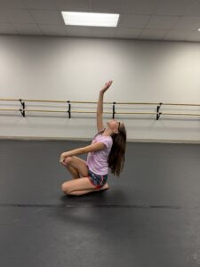 Lyrical I - pose Dancer working on her emotion in lyrical class