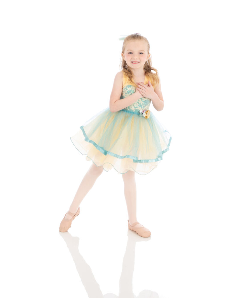 Beginner combo class at LA Dance. This primary level ballet dancer is doing an arabesque with a smile.