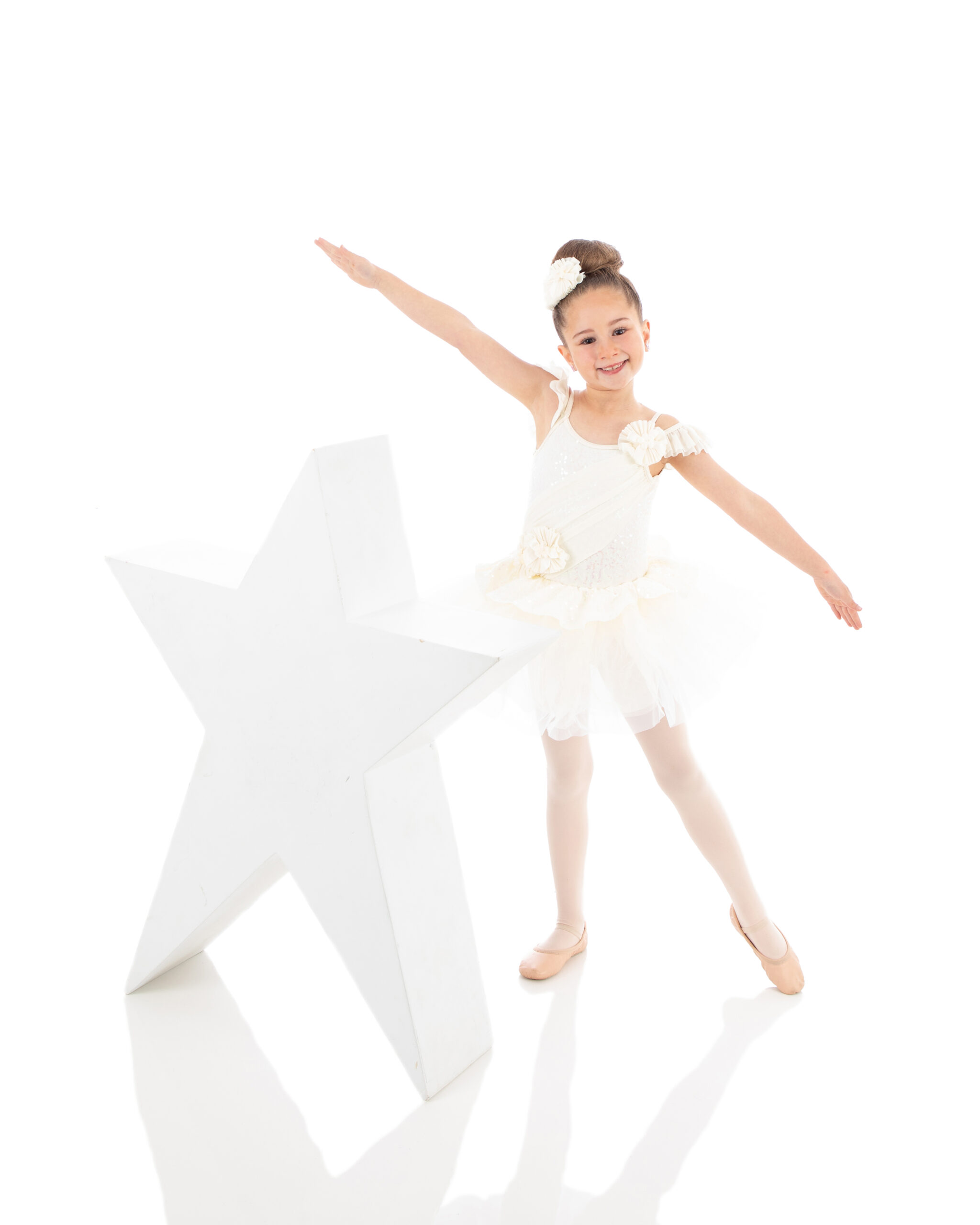 Young beginner level ballet dancer in an arabesque. She learned proper terminology in ballet I class at LA Dance Academy