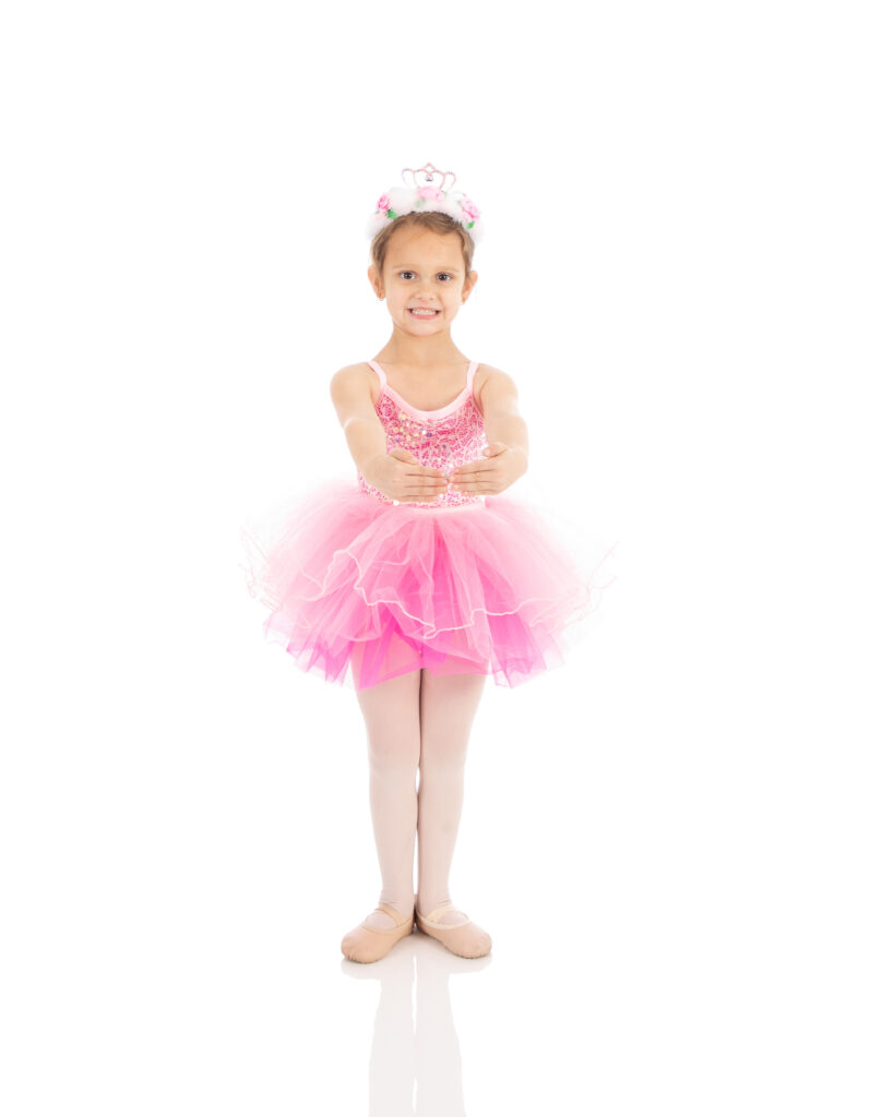 Preschool ballet dancer doing 1st position. She is so proud of all the hard work and all the steps she learned in Tiny Dancer I class at LA Dance.