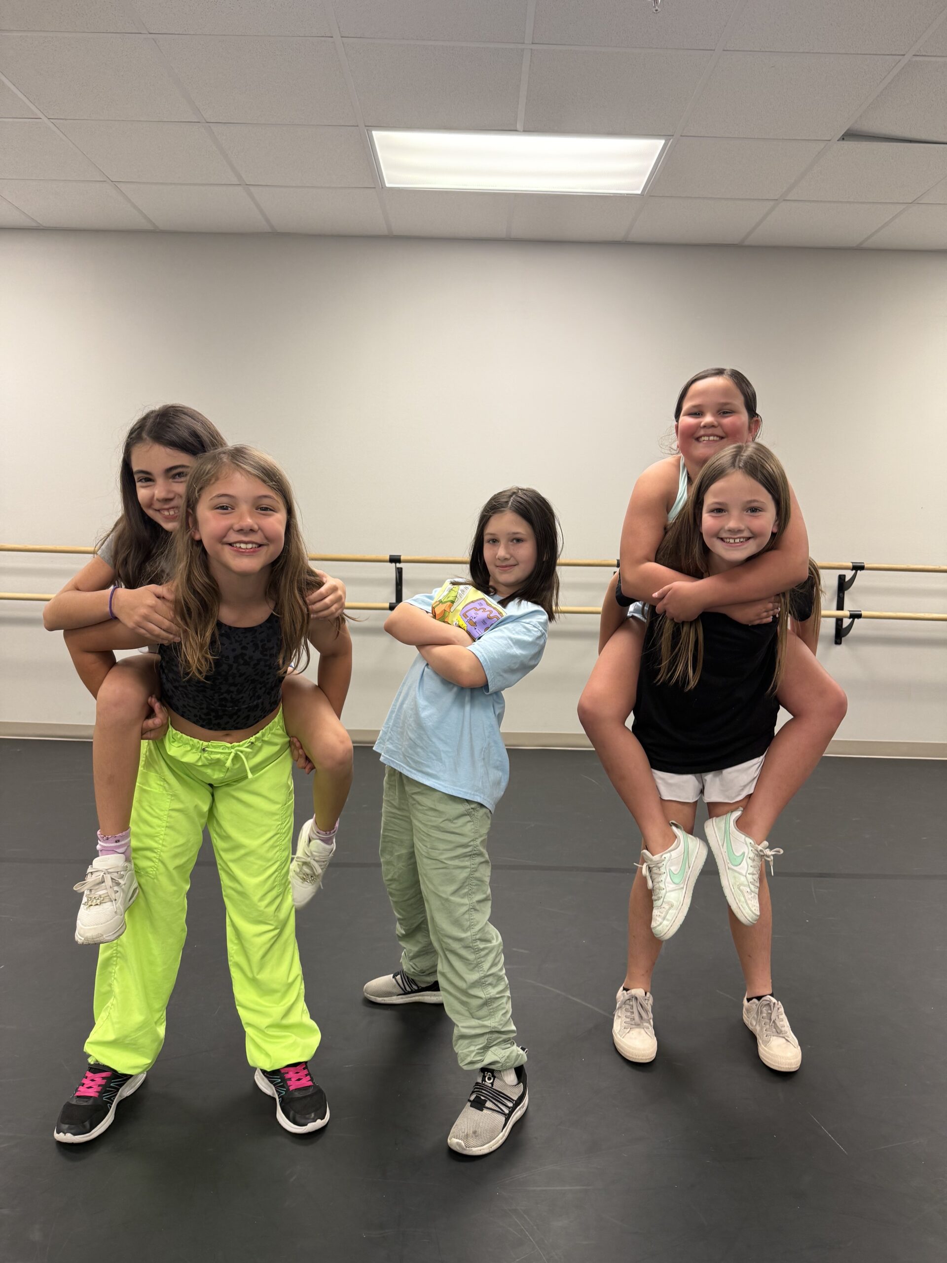 Hip Hop dancers having fun together in class with some sassy poses.