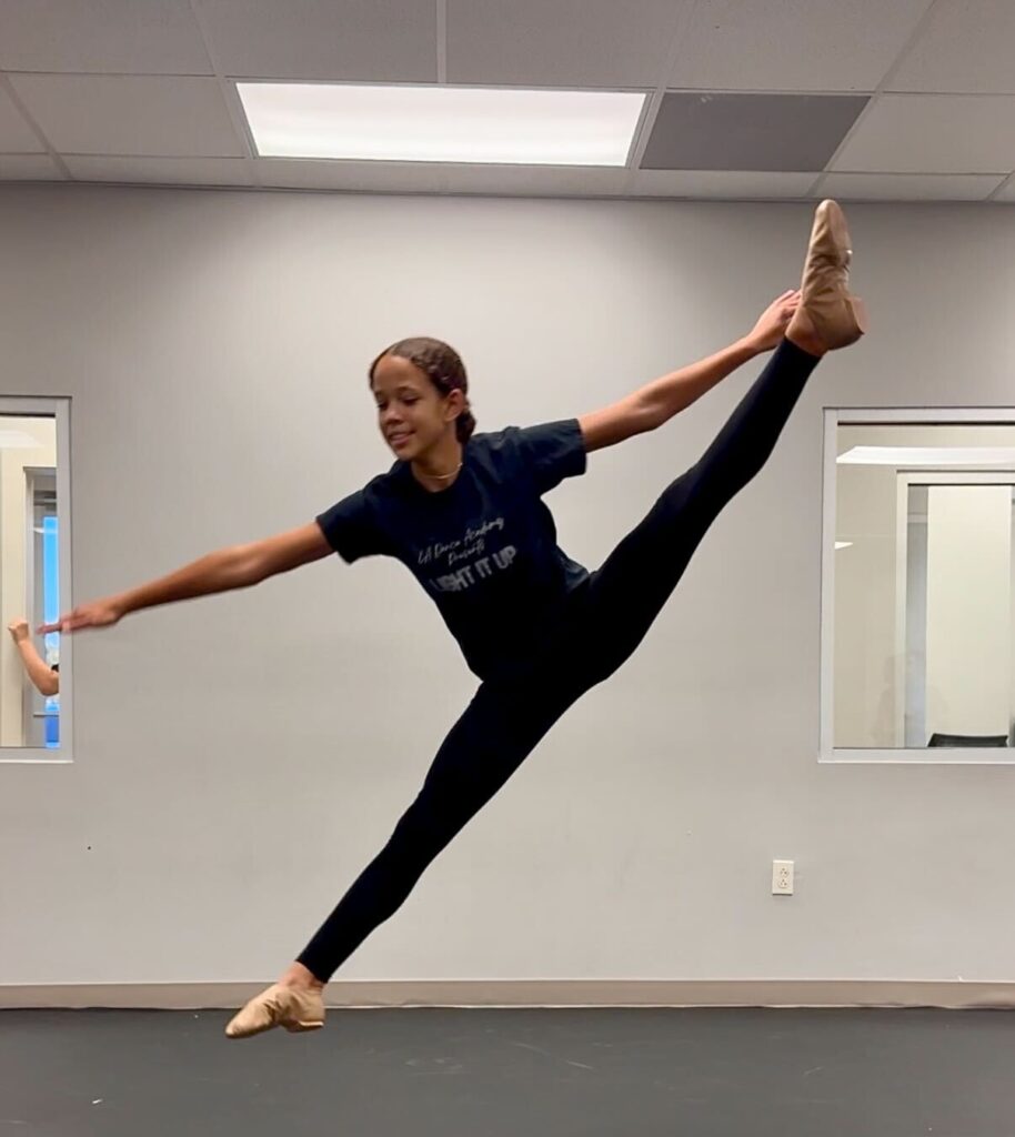 Young dancer learning that if she keeps working hard in class her goals will be reached.
